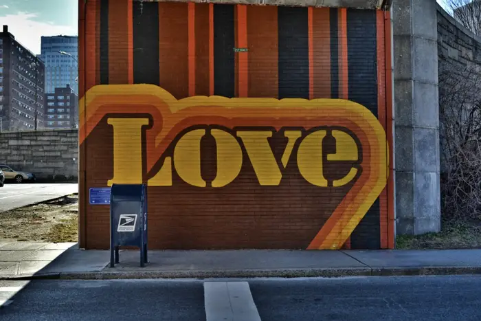 a mural that says "Love"
